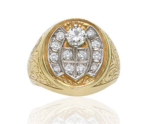 Large gold ring with many inset white gems